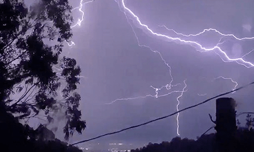 Thunderstorm in night sky.